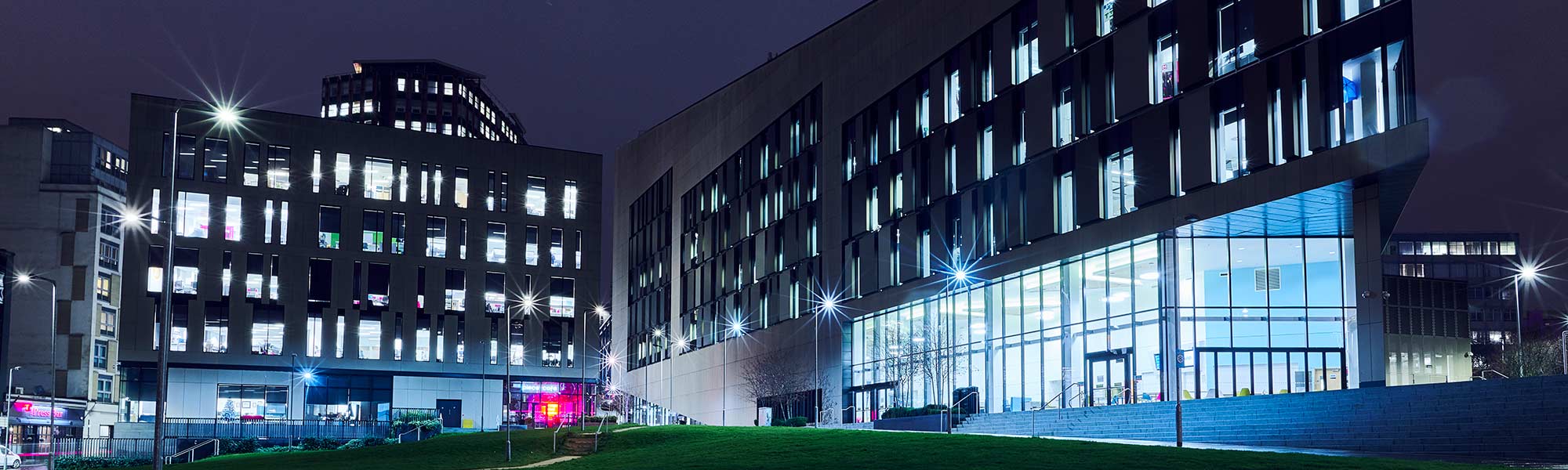 Technology & Innovation Centre and Inovo buildings at night.