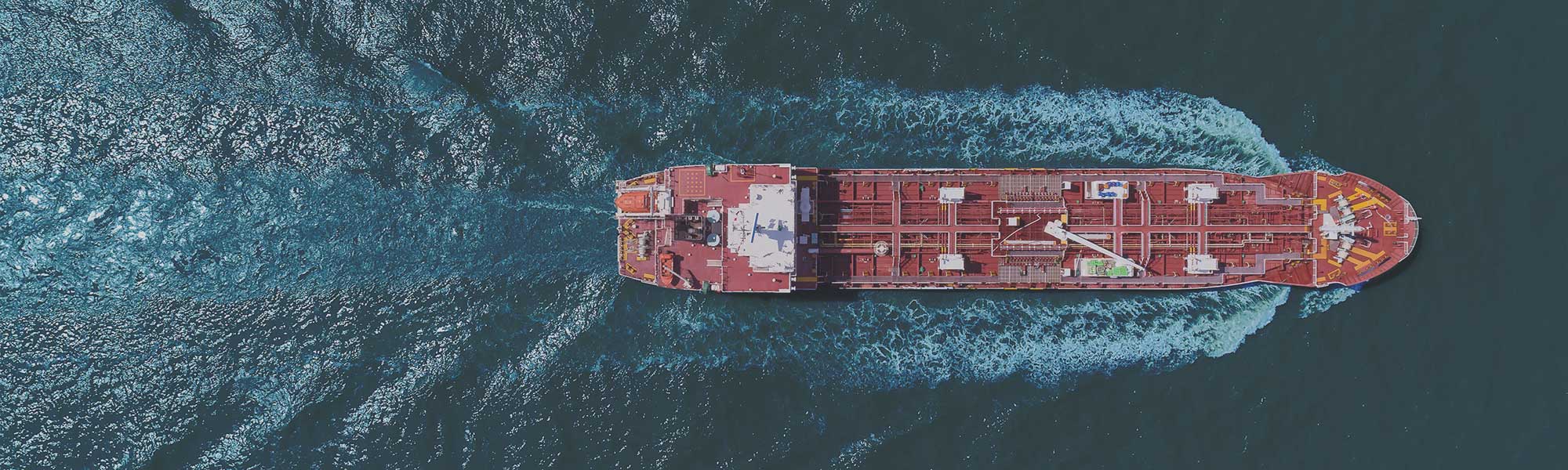 Aerial view of a ship on the ocean.