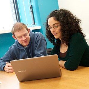 Students using a laptop