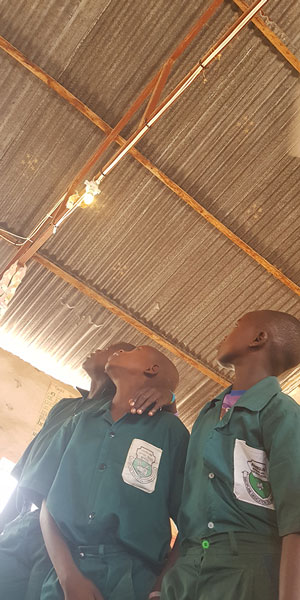 pupils staring at a light in the ceiling