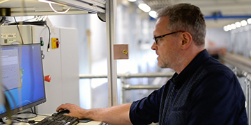 Technician Grant reading data.