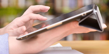 Girl reading tablet