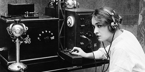 Woman sending Morse code 