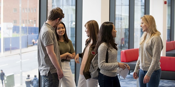 Students talking in Stenhouse Wing