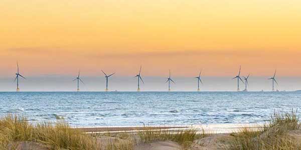 Offshore wind farm in the distance.