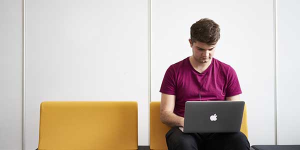 Student working on a laptop