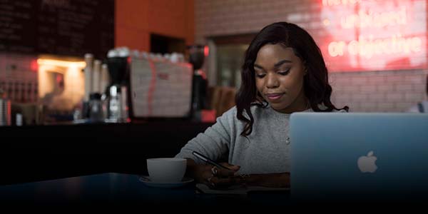 Student studying in a cafe.