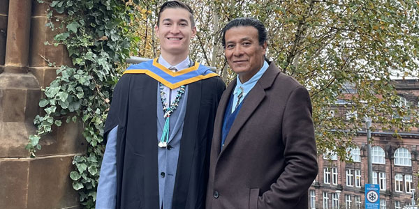 Tiger and his father on his graduation day