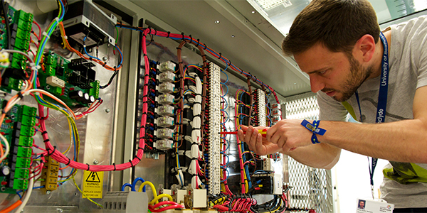 Student working in an electronic & electrical engineering lab