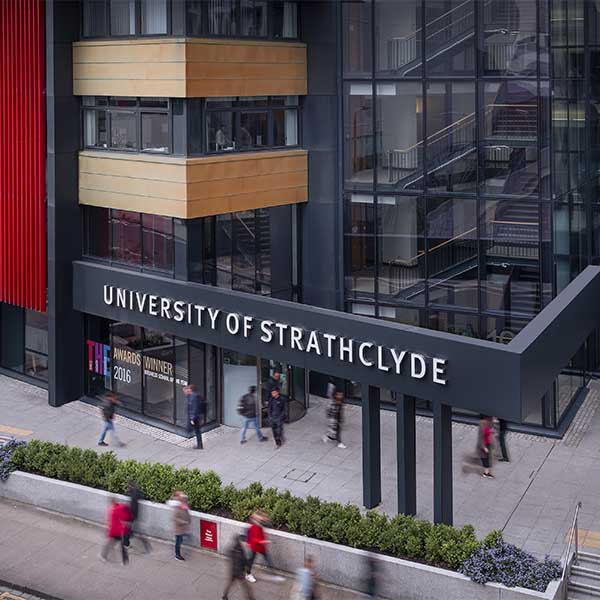 Front entrance to Strathclyde Business School with people walking by