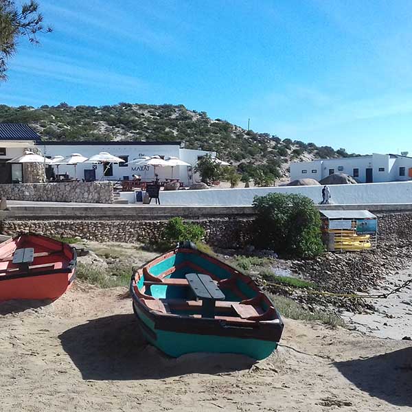 Small fishing boats on a beach in South Africa.