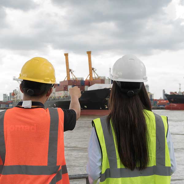 Marine engineers looking at a ship.