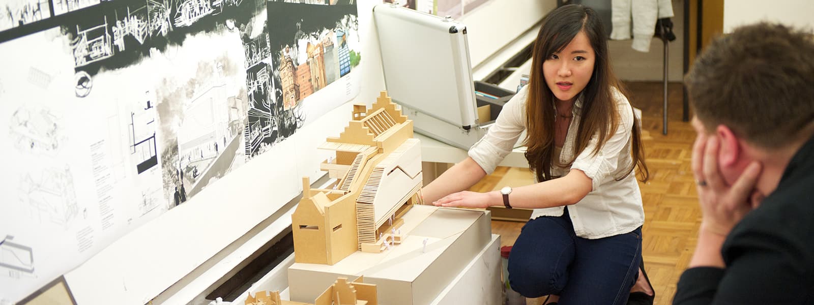 Architecture student with model