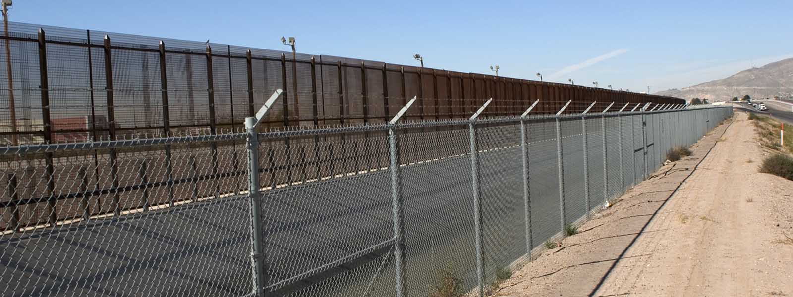 Three lines of border fence