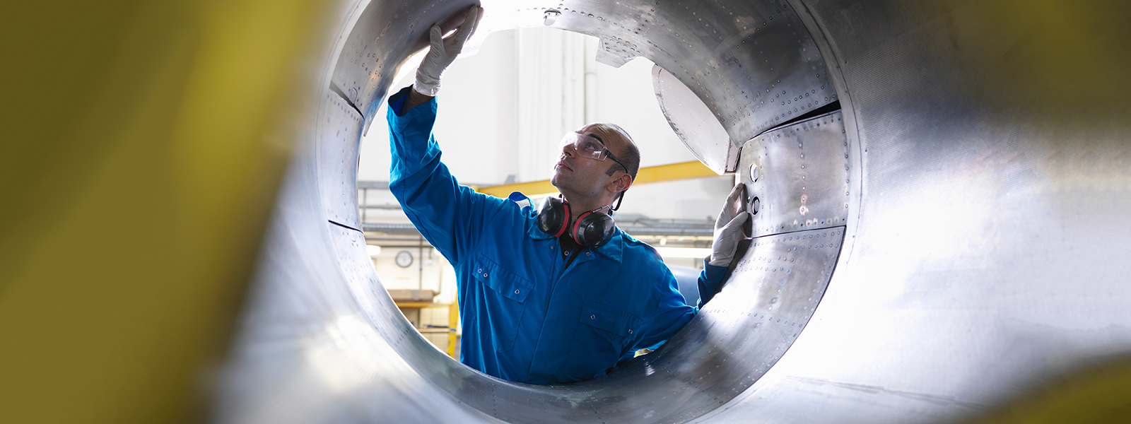 Engineer works with turbines.