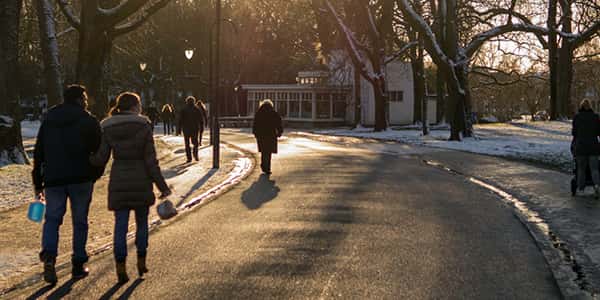 People walking in the park in winter