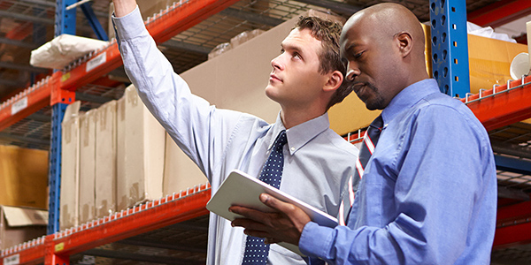 Two workers in a wholesalers.