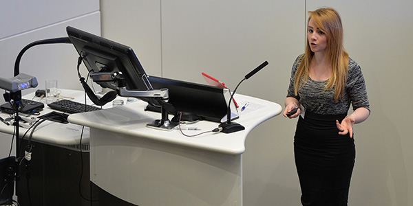 Student presenting to a lecture theatre