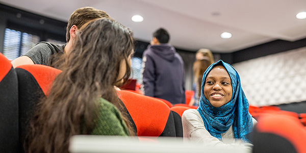 Students speaking in a lecture 