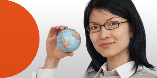 Woman holding a globe