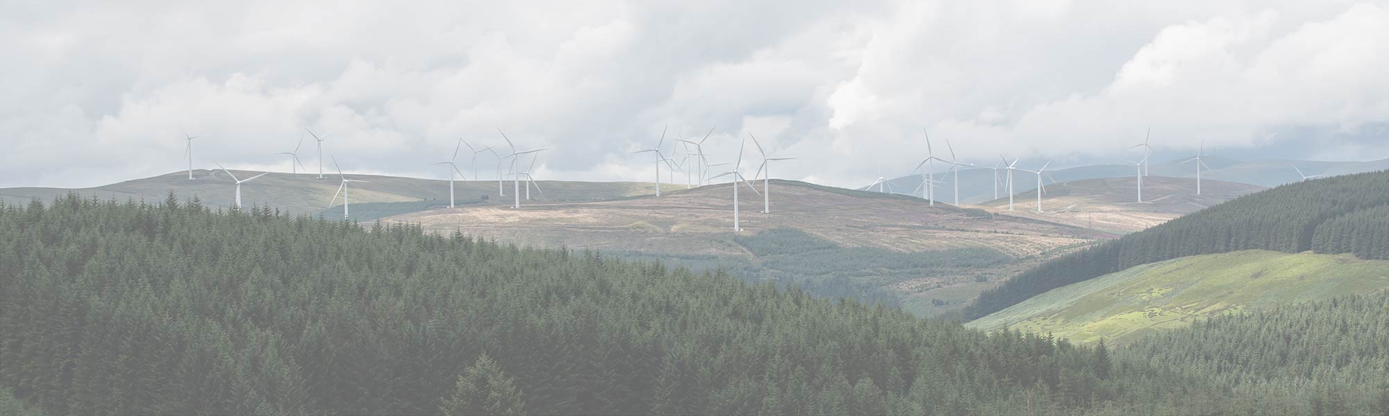 A modern wind farm in the Scottish Hills.