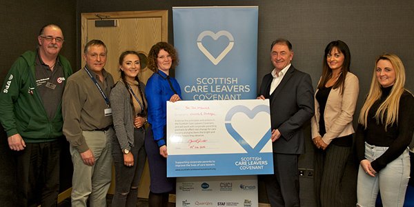 Professor Sir Jim McDonald signs the Scottish Care Leavers' Covenant on behalf of the University of Strathclyde