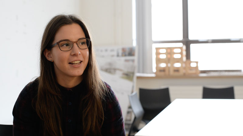 an image of a female student being interviewed on camera