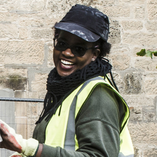 student in Hi -Vis vest