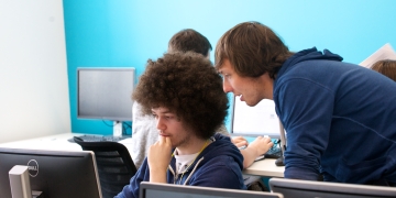 Two Chemical Engineering, Engineering Academy Students Using Computer 360x180