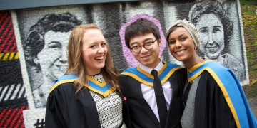 Three Chemical Engineering Graduating Students Laughing 360x180