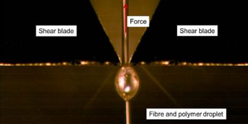 High magnification image showing how a microbond test is carried out