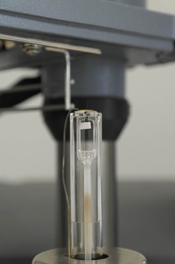 Thermo Mechanical Analyser stage and probe set up to carry out an in-situ microbond interfacial shear test