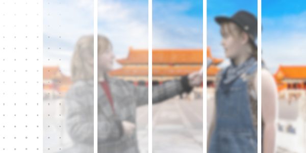 a student interviews another student in the Forbidden City (Beijing, China)