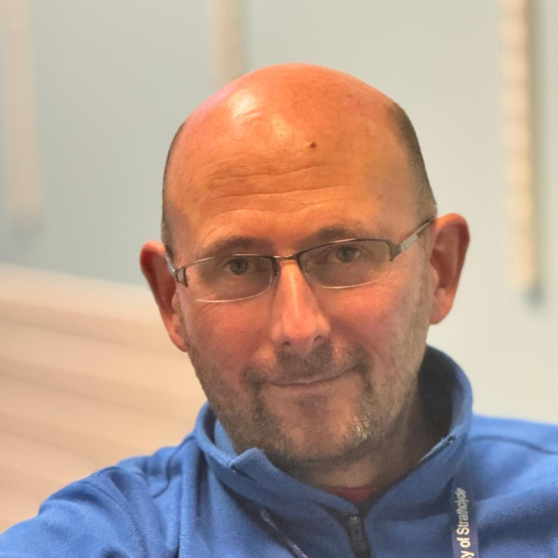 Headshot of Dr Brian McMillan