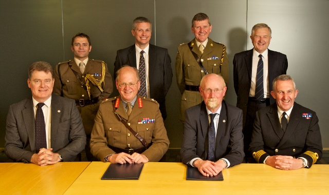 Major General Mike Riddell-Webster CBE DSO Late BW, Director College of Management and Technology, and Professor Kenneth Miller, Vice-Principal, signing a partnership agreement.