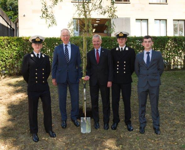 Members of Glasgow and Strathclyde URNU, UOTC, UAS and MEC at the ceremony for the planting of willow trees.