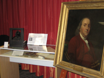 Display with portrait of Benjamin Franklin.