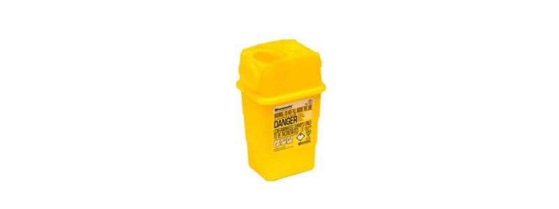 A yellow container for sharps