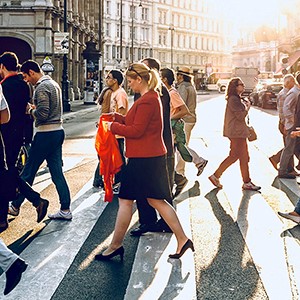 People crossing the road in a city