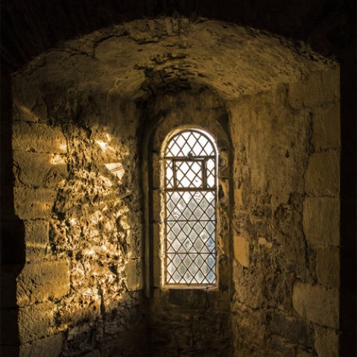 Stone wall surrounding a castle window