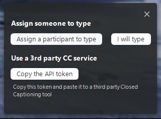Screenshot of the Zoom dialogue box for assigning a participant to type captions during a meeting for caption production