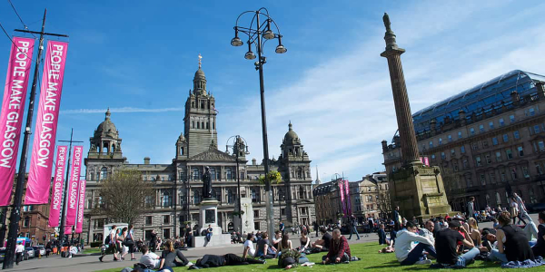View of Glasgow City Chambers from George Square on a sunny day.