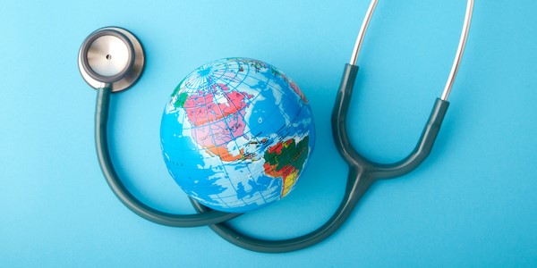 World globe and stethoscope