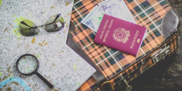 Passport map and sunglasses on a table