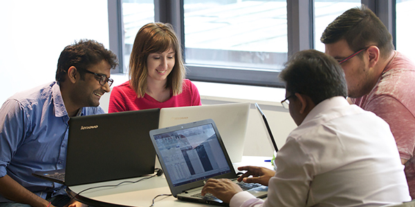 Postgraduate students in the library