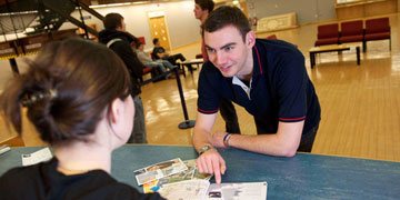 Student receives help and advice from student adviser.